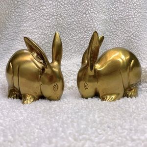 Two brass sitting bunnies